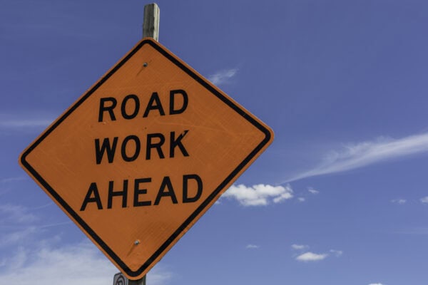 Orange "Road Work Ahead" sign